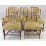 A SET OF EIGHT 19TH CENTURY ELM DINING CHAIRS, one with arms and one later, with stepped top