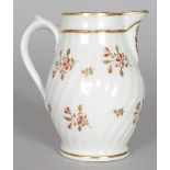 AN EARLY CHAMBERLAIN WORCESTER SPIRALLY MOULDED MILK JUG painted with pattern 183 bearing Godden