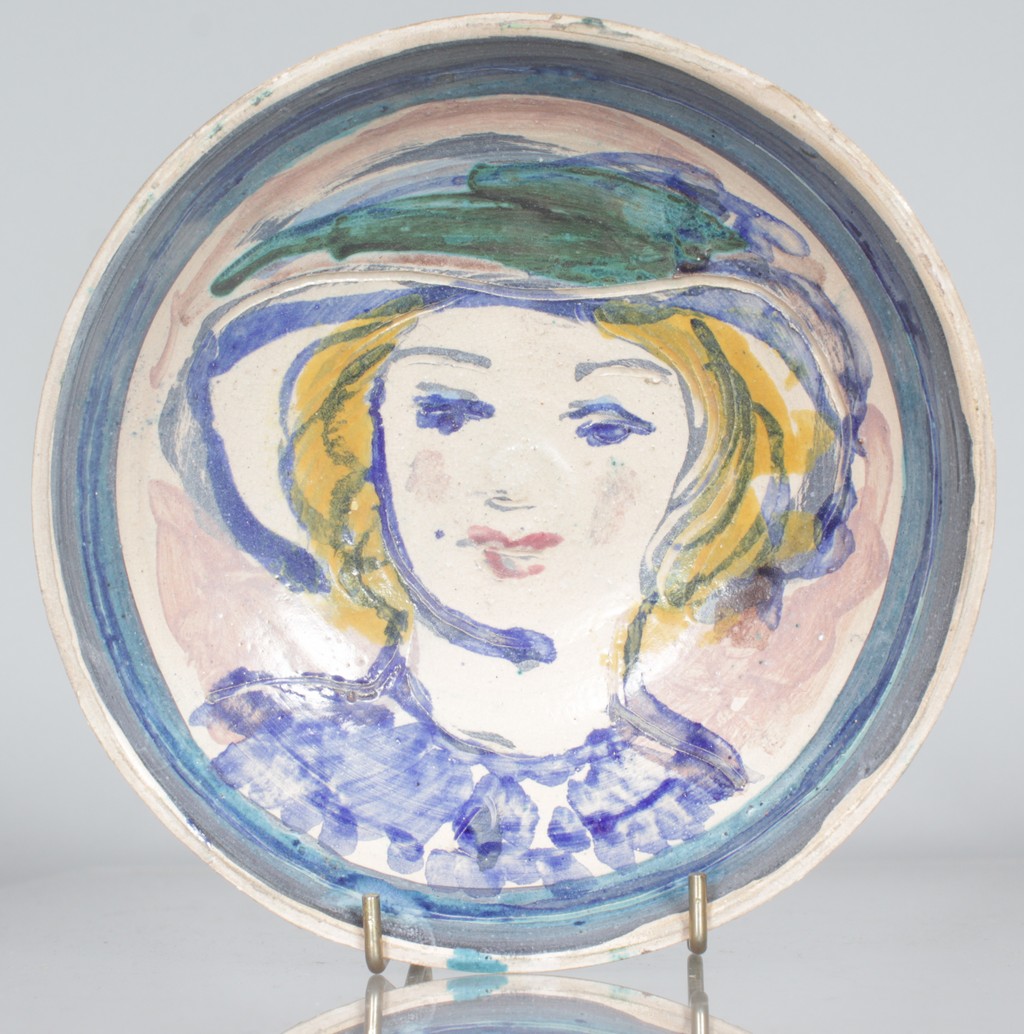 QUENTIN BELL POTTERY, FULHAM (1910-1996) A CIRCULAR POTTERY BOWL, painted head of a girl in blue and