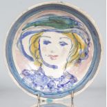 QUENTIN BELL POTTERY, FULHAM (1910-1996) A CIRCULAR POTTERY BOWL, painted head of a girl in blue and