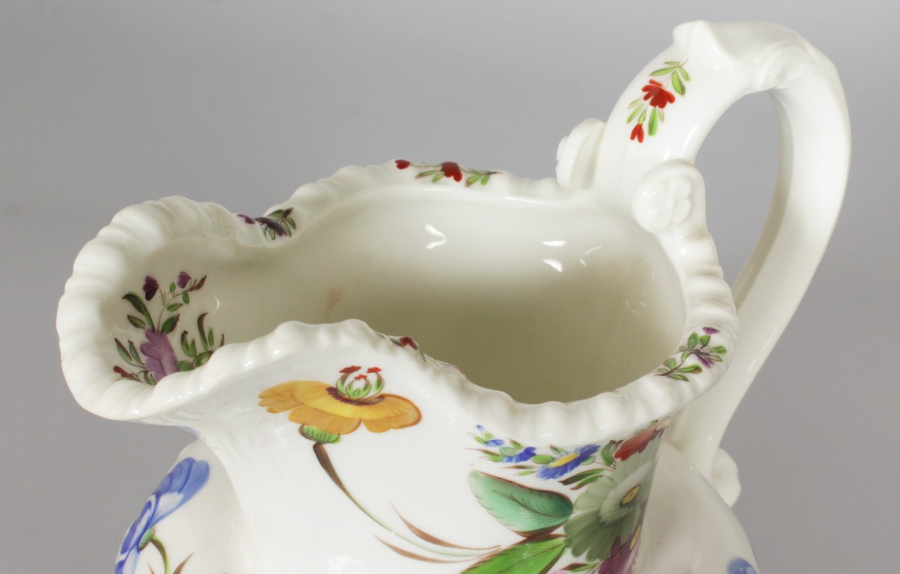 19TH CENTURY COALPORT FINE MOULDED WATER JUG painted with flowers. - Image 2 of 3