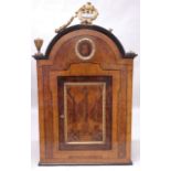 AN I8TH CENTURY ITALIAN WALNUT AND AMBOYNA CABINET, the arched top having a carved, gilded and