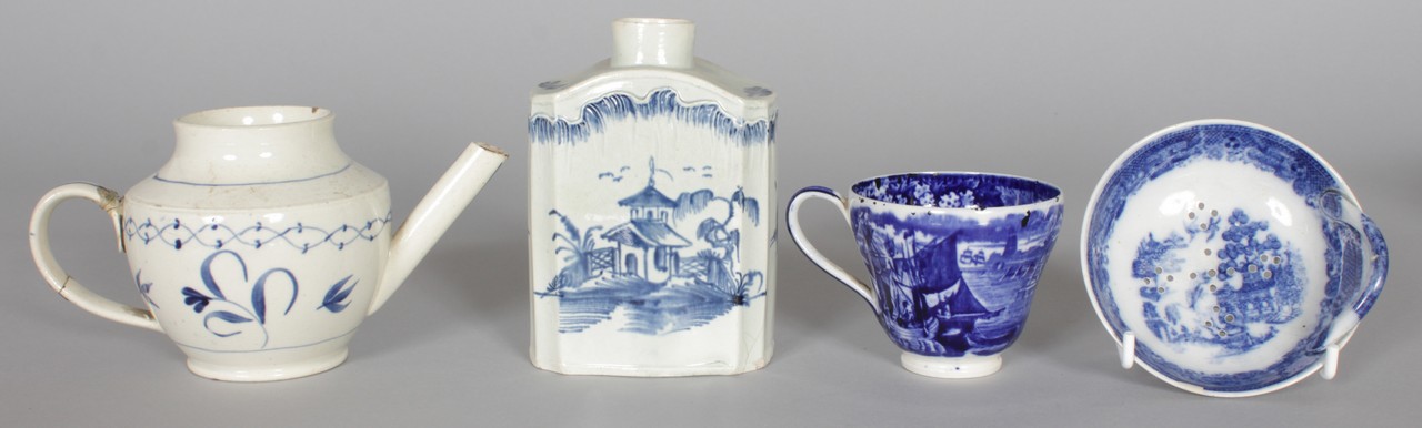 A LATE 18TH / EARLY 19TH CENTURY LIVERPOOL PEARLWARE TEA CANISTER painted on each side with a