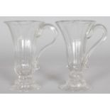 TWO 18TH CENTURY RIBBED SYLLABUB GLASSES, one with an air twist stem. 4.5ins high.