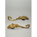 A Pair of Large Warring States Period Gilt Bronze Belt Hooks