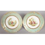 A PAIR OF PLATES painted with figure dancing and in a classical garden. Pattern No. 4/N01056.