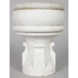 A CARVED MARBLE CIRCULAR FONT. 9ins high.