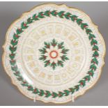 A RARE CHRISTMAS PLATE 1851, the border with holly and berries. 9ins diameter. Col No. 217.