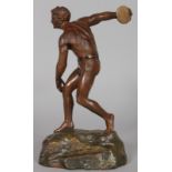 AFTER THE ANTIQUE A discus thrower. Signed. 12.5ins high.