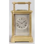 A GOOD 19TH CENTURY FRENCH REPEATER CARRIAGE CLOCK, retailed by EDWARDS & SON, GLASGOW. 7ins high.