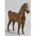 A BRONZE STANDING HORSE. 6.5ins high.