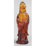 AN AMBER GUANYIN FIGURE. 4ins high.