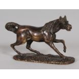 A SMALLER CAST BRONZE HORSE. 3.25ins long.