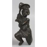 A BRONZE KNEELING CHERUB. 9ins high.