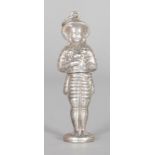 A SILVER MAN IN COSTUME DRESS NEEDLE CASE.