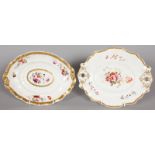 TWO OVAL TWO HANDLED DISHES, with gilt borders and painted with flowers. Pattern No. 1031, Col No.