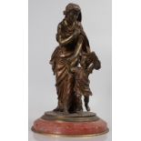 19TH CENTURY FRENCH A GOOD GILDED BRONZE GROUP depicting WINTER, a woman shielding a young child,