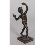 AFTER THE ANTIQUE A SMALL BRONZE OF THE DANCING FAUN (PAN). 6ins high.