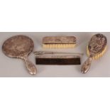 A GROUP OF FIVE EARLY 20TH CENTURY JAPANESE SILVER ITEMS, comprising two brushes, a hand mirror, a