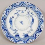 A CHINESE KANGXI MARK & PERIOD BLUE & WHITE PORCELAIN CUP STAND, circa 1700, painted with 'long