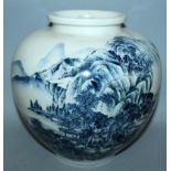 AN EARLY 20TH CENTURY SIGNED JAPANESE EARTHENWARE VASE, the sides painted in shades of blue and