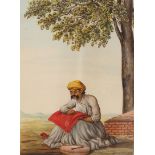 A FINE QUALITY 19TH CENTURY FRAMED INDIAN PAINTING ON PAPER, portraying a seated man embroidering