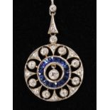 A LOVELY DIAMOND AND SAPPHIRE CIRCULAR PENDANT on a yellow gold chain set with diamonds.