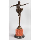 AFTER J. PHILIPP, A BRONZE DANCER. Signed, on a circular marble base. 22ins high.