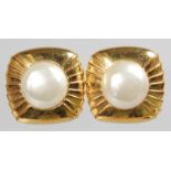 A LARGE PAIR OF CHANEL GILT AND PEARL EAR CLIPS.