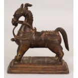 AN 18TH/19TH CENTURY INDIAN BRONZE MODEL OF A HORSE, standing on a rectangular plinth, the bronze