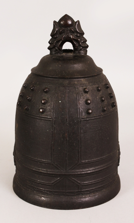 A 19TH CENTURY CHINESE BRONZE MODEL OF A TEMPLE BELL, the shoulders cast in relief with studs, 5.