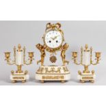 A GOOD LOUIS XVI ORMOLU AND MARBLE THREE PIECE CLOCK SET, comprising drum clock with eight-day