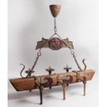 AN OAK AND METAL ELIZABETHAN DESIGN CHANDELIER with six candle holders. 2ft 8ins long.