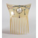 A GOOD HORN COMB in the Art Nouveau manner with silver and pearl mounts.
