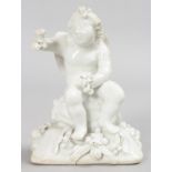 AN EARLY BOW WHITE GLAZED FIGURE OF A WINGED CUPID, CIRCA. 1757, sitting on a melon with fruiting