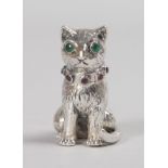 A NOVELTY SILVER CAT PIN CUSHION.