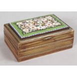 A SIMILAR GILT METAL JEWELLERY BOX with flower encrusted lid. 2.75ins.