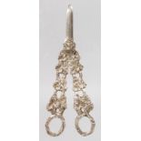 A PAIR OF CAST GRAPE SCISSORS decorated with fruiting vines.