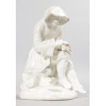 AN EARLY BOW WHITE GLAZED FIGURE OF WINTER, CIRCA. 1757, a seated man in a coat with hood sitting on