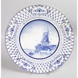 A DELFT BLUE AND WHITE CHARGER, windmill scene. 15ins diameter.