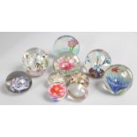 A SMALL COLLECTION OF TEN VARIOUS PAPERWEIGHTS.