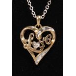 A 10CT YELLOW GOLD DIAMOND HEART SHAPED PENDANT AND CHAIN.