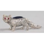 A NOVELTY SILVER FOX PIN CUSHION.