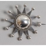 A SCOTTISH SILVER STAR BROOCH.