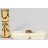 A GEORGE III IVORY SCENT BOTTLE painted with garlands, 2ins long, and A GEORGIAN IVORY PATCH BOX,