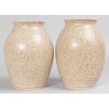 A PAIR OF ROYAL DOULTON STONEWARE SPECKLED VASES. 9.5ins high.