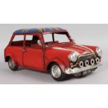 A RED TIN MINI with Union Jack top.