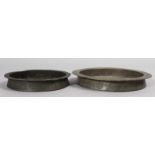 TWO ENGRAVED ISLAMIC CIRCULAR BOWLS. 7.5ins and 6ins diameter.