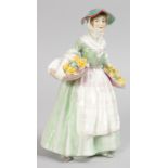 A ROYAL DOULTON FIGURE "DAFFY-DOWN-DILLY", No. HN1712, Issue 1935-1949. 8.25ins high.