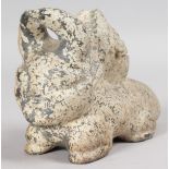 AN ISLAMIC CARVED STONE ANIMAL. 8ins long.